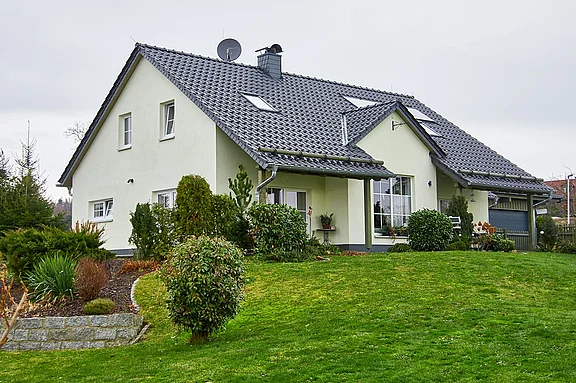 Schlüsselfertiger Neubau eines Einfamilienhauses in Walddorf mit Garten
